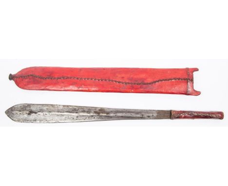 A Masai sword, seme, unusually wide blade 16½" x 2" at widest, with plain rawhide covered hilt, in its rawhide scabbard with 