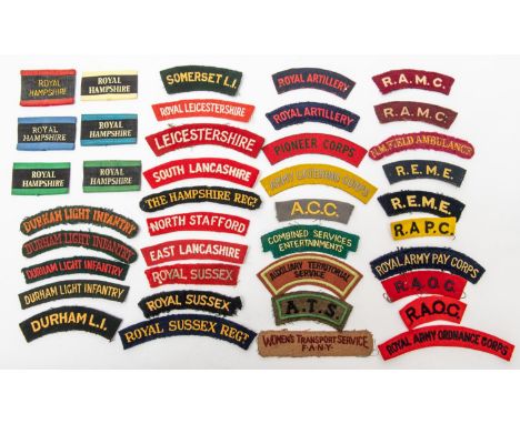 A selection of British WWII shoulder titles including Royal Hampshire variations, Durham Light Infantry variations. (40) £80-