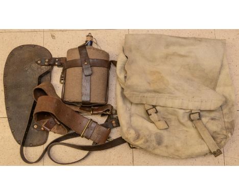 1914 pattern equipment, a "Kitchener's Equipment" waist belt ; a water bottle and cradle; a large pack and pair of straps; al