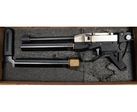 A .177 Feinwerkbau Model C5 CO2 Match Target pistol, number 1073, with 10 shot rapid fire magazine, spare CO2 cylinder, spann