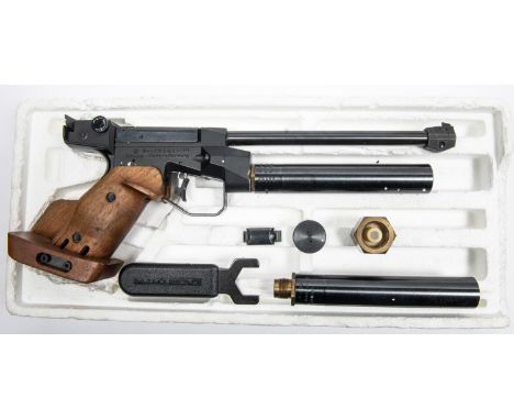 A .177" Feinwerkbau Model C10 single shot CO2 Match Target Pistol, number 28666, with walnut grips. Near VGC, cocks and trigg