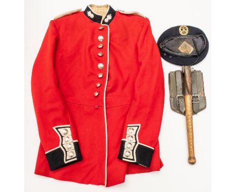 A Grenadier Guards OR's scarlet tunic, with staybright buttons, the label dated 1959; an East German folding entrenching tool