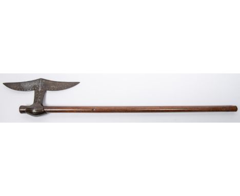 A 19th century Indian axe from Chota Nagpur, 27" overall, moustache shaped blade 9½" with simple punched decoration, on plain