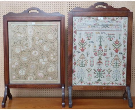 A lot comprising a 20th century mahogany framed sampler fire screen, 88cm high x 55cm wide and another tapestry fire screen, 