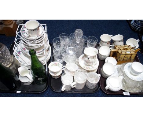 A Royal Doulton Autumn's Glory tea and dinner service, a Wedgwood Belle Fleur tea set, two empty Perrier Jouet Belle Epoque b