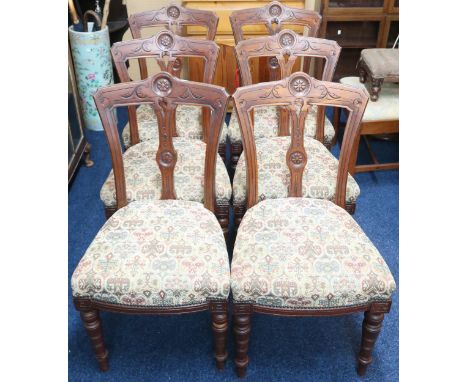 A set of six Victorian walnut framed dining chairs with tapestry upholstered seats on turned supports, 92cm high (6) Conditio
