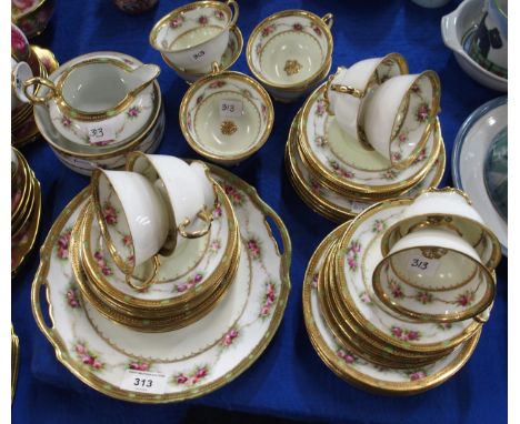 A Noritake 12 place tea set, the cream ground with rose and gilt decoration&nbsp; Condition Report:Available upon request