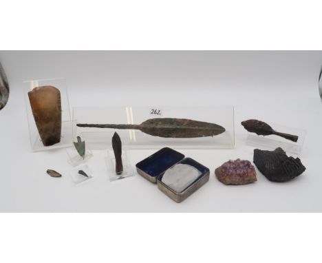 A stone axe head, assorted arrow and spear tips and other items Condition Report:Available upon request