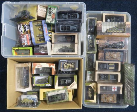 A large quantity of packaged scale model military vehicles, to include examples by atlas Editions, Solido and Victoria; with 