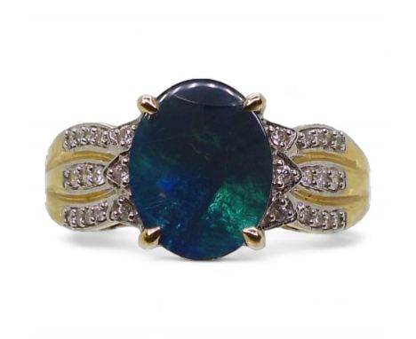 An 18ct gold GemsTV opal doublet and diamond ring, size O, weight 3.4gms Condition Report:Available upon request