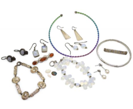A rainbow titanium torc necklet, a 'Hot Diamonds' silver bangle, a silver Shipton &amp; Co Viking longship bracelet, two loos