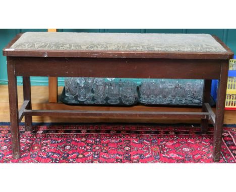 An early 20th century tapestry upholstered duet piano stool, 55cm high x 102cm wide x 39cm deep Condition Report:Available up