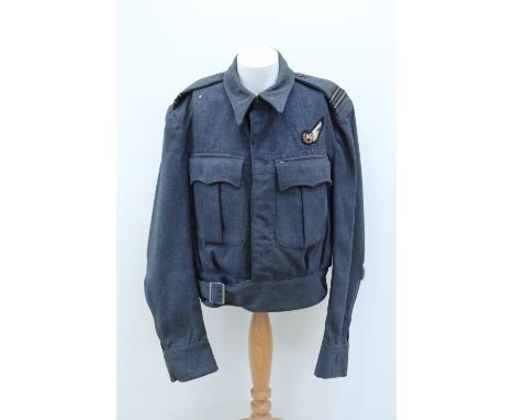 A Second World War RAF War Service Blouse, bearing flight lieutenant rank insignia and an Air Gunner's brevet, dated 1944