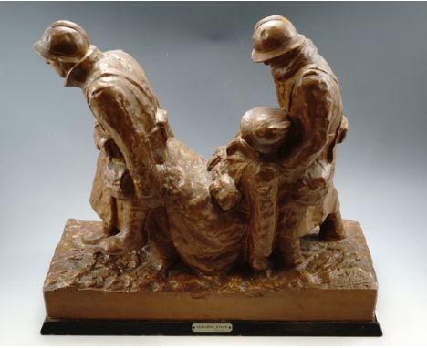 After E Dolphault (?) "Derniere Stape" [The Last Step] A painted plaster sculpture depicting French army medics carrying a wo