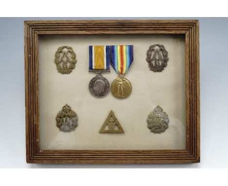 British War and Victory medals and related cap and other badges pertaining to 1611 Worker Dorothy Irene Jones, Queen Mary's A
