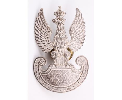A Free Polish army silvered cap badge, naively inscribed verso, 5255 mm