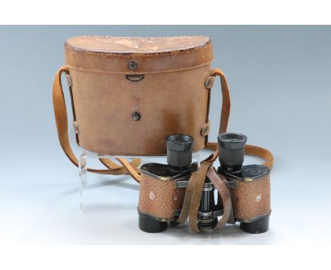 A cased set of US Army Signal Corps Bausch and Lomb prismatic binoculars bearing RAF / Air Ministry stores reference number 6
