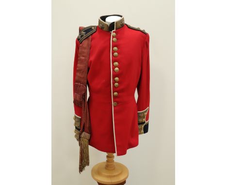 An early 20th Century Coldstream Guards Lieutenant's full dress tunic and waist sash