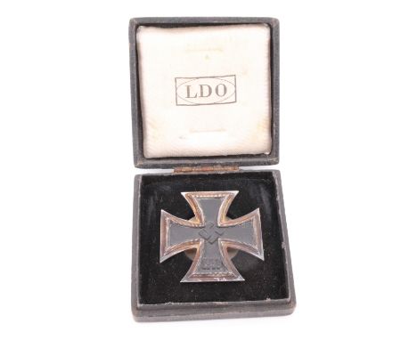 A German Third Reich cased Iron Cross first class, being a screw-backed variant stamped L/54