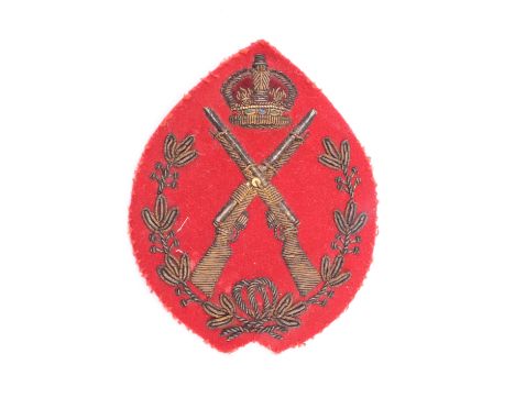 An early 20th Century army sergeant / warrant officer regiment or battalion best shot bullion embroidered badge