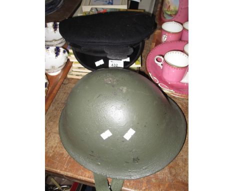 Naval officer's cap and a Russian type army helmet. (2)