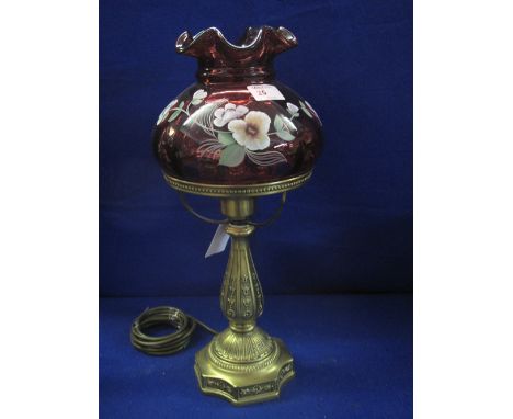 Brass table lamp in 19th century style with painted ruby glass shade. 