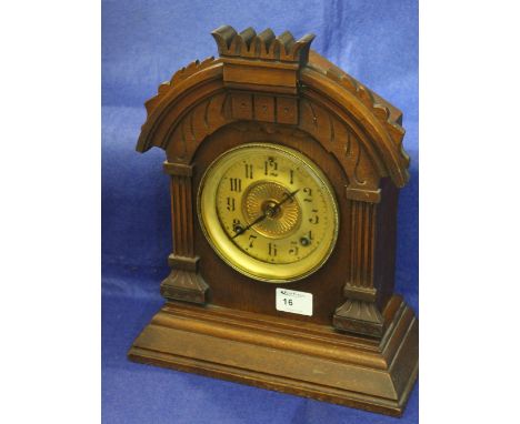 Early 20th century American gingerbread type two train architectural mantle clock. 