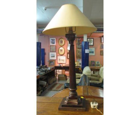 Mahogany table lamp on square stepped base. 
