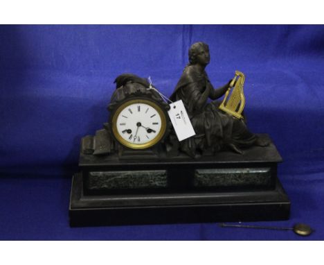 19th century French two train bronzed figural mantle clock on marble base. Emblematic of music. 