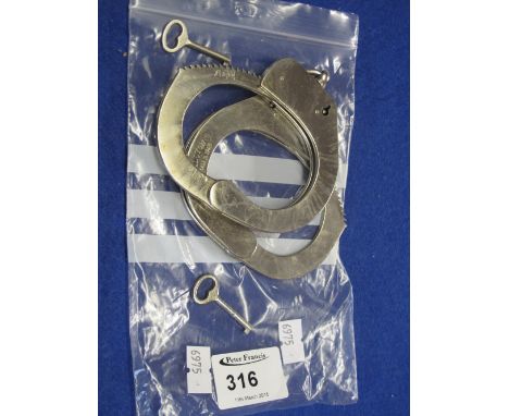 Pair of Alcyon Spanish cufflinks with keys. 