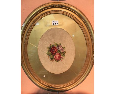 Two needlepoint tapestry panels depicting sprays of flowers, within oval glazed frames. (2)