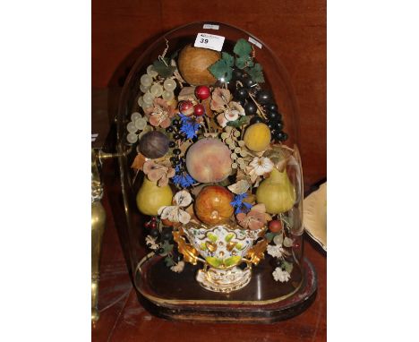 Porcelain gilded and floral decorated vase supporting an arrangement of simulated fruit amongst flowers under a glass dome. 