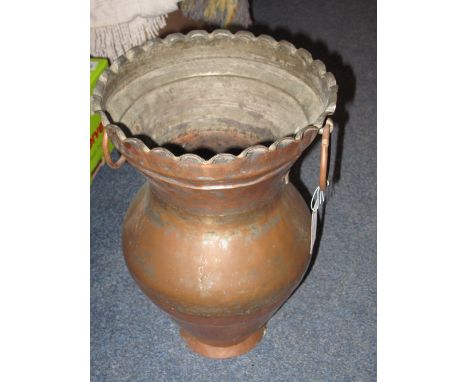 Large copper baluster vase or planter with ring handles. 