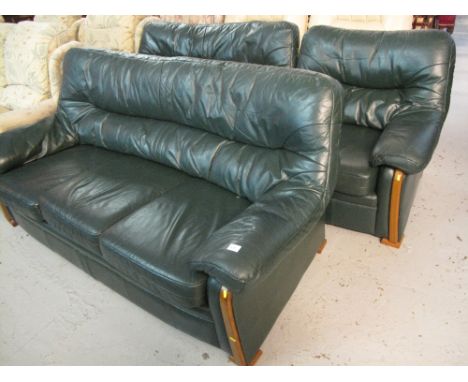 Modern green leather three piece suite comprising three seater sofa, two seater sofa and a matching armchair. (3)