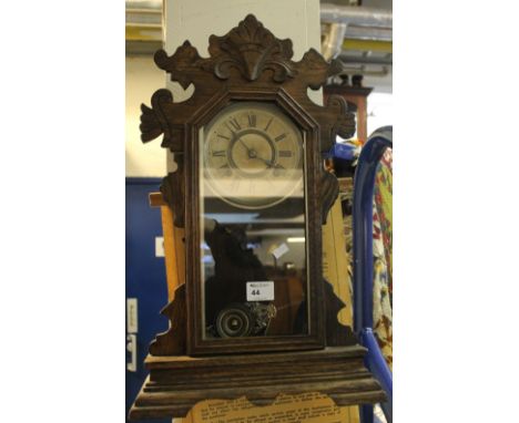American gingerbread type mantle clock with two train movement. 