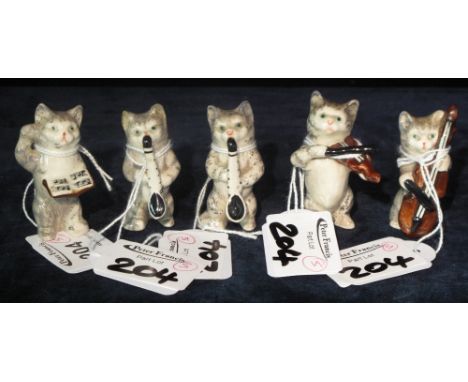 Group of five Beswick china cat musicians. (5)
 CONDITION REPORT: Chips to ears of cat playing saxophone others fine but craz