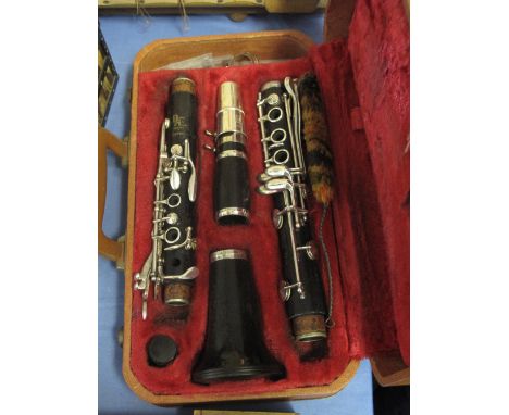 Cased boosey and a Hawks London clarinet, Emperor. Being sold on behalf of the Samaritans. 