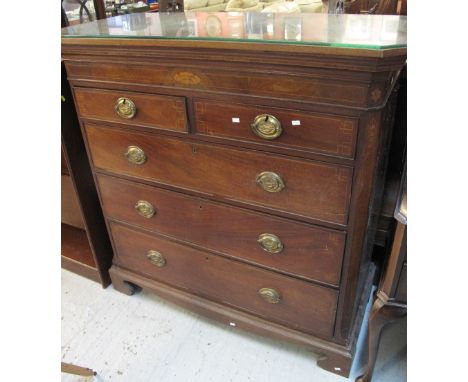 Edwardian mahogany inlaid chest of two short and three long drawers with brass oval loop handles on bracket feet. 