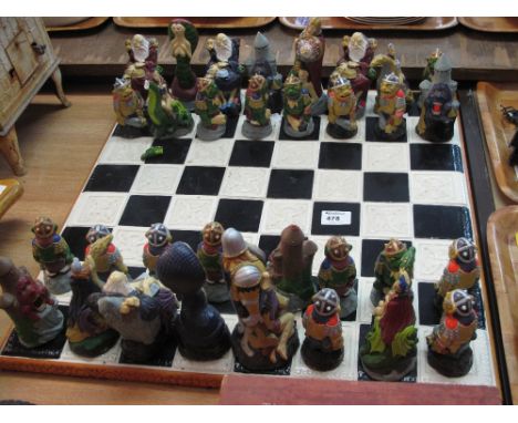 Ceramic and wooden chess board with Celtic design together with Medieval figures and creatures. 