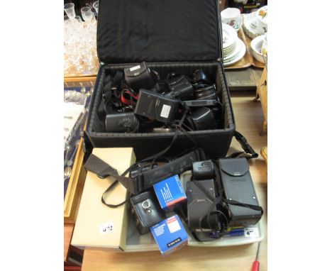 Large collection of camera lenses and other related equipment including Vivisar 28-200mm macro focusing zoom, Tamron 28-70mm 