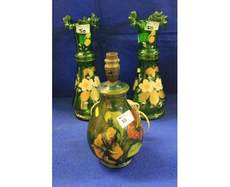 Moorcroft art pottery floral decorated green ground lamp base (AF). Together with a pair of green glass conical shaped painte