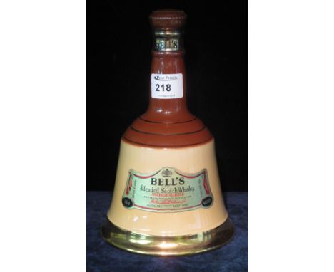 Bells Blended Scotch Whiskey bell shaped decanter and contents. 