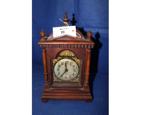 German stained wooden architectural mantle clock with silvered and brass face. Early 20th century. 