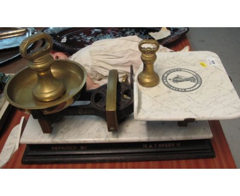 The Globe balance rectangular scales by W & T Avery Limited. Together with set of graduated brass bell weights. 