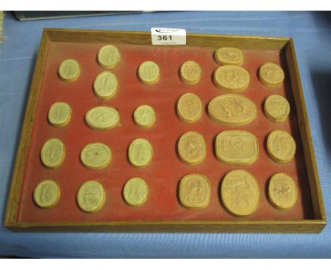 Collection of Roman design Intaglios all with figure decorations.  CONDITION REPORT: Intaglios are glued onto tray.  Some lig