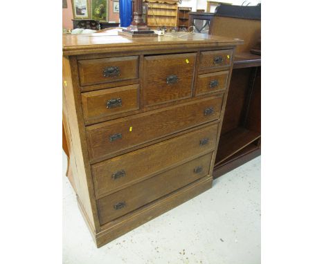 Edwardian oak Scotch type chest of drawers on a platform base. 