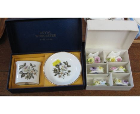 Boxed Coalport floral bouquets together with Royal Worcester bone china vase and saucer. (2)