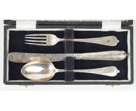 A Victorian silver christening flatware setEngraved with foliate and leaf decoration, comprising; fork, spoon and silver blad