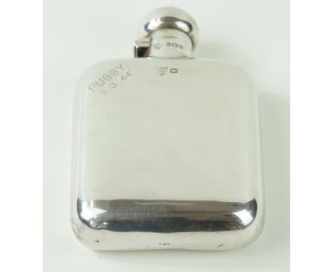 A George V hallmarked silver hip flask Of plain rectangular form, engraved with name and date, by G & J W Hawksley, Sheffield
