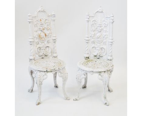 A pair of Victorian style cast iron garden seatsEach with ornate high backs cast and pierced with portrait busts and mixed fo